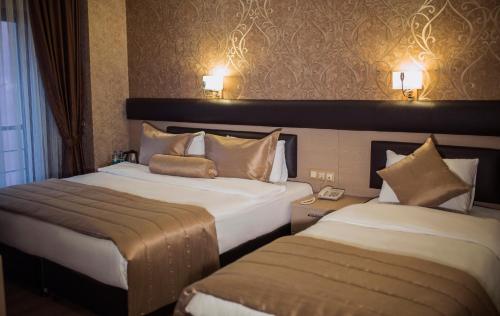 Payidar Hotelにあるベッド