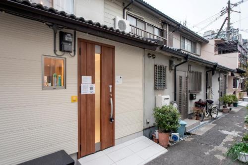 旅 居Tamade