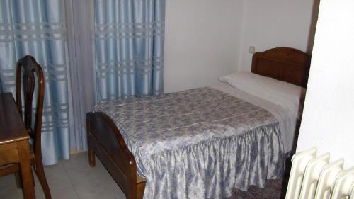 Cama o camas de una habitación en Hostal Rivera - Atocha