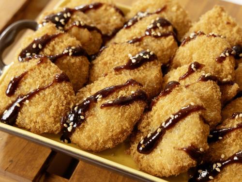 a plate of cookies with chocolate sauce on top at KOKO HOTEL Nagoya Marunouchi - formerly Hotel Wing International Nagoya in Nagoya