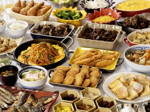 a table topped with lots of different types of food at KOKO HOTEL Nagoya Marunouchi in Nagoya