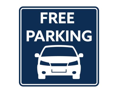 a sign that says free parking with a car on it at Bromsgrove Hotel in Bromsgrove