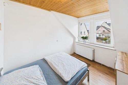 Llit o llits en una habitació de Ankas´s Ferienwohnung