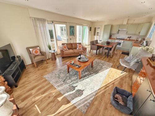 a living room with a couch and a table at KRAB160 in Sint Annaland
