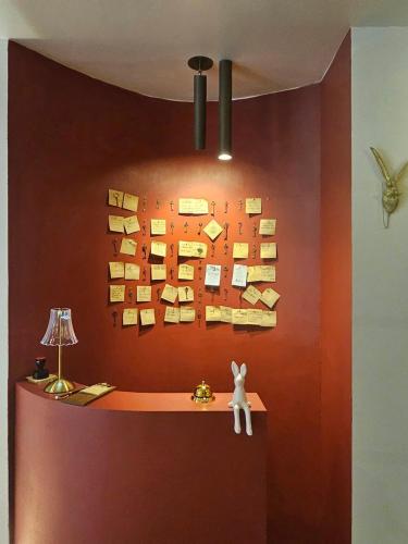 a wall with a bunch of books on it at Jeonju Hotel Stay Bok-e in Jeonju