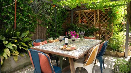 Foto Il Cortiletto - Cozy Apt Brand New Equipped Private Garden - BBQ 1