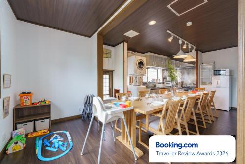 a kitchen and dining room with a table and chairs at Nagashima Onsen Villa Kuwana ,Family & Group Stay with Private Onsen in Kuwana