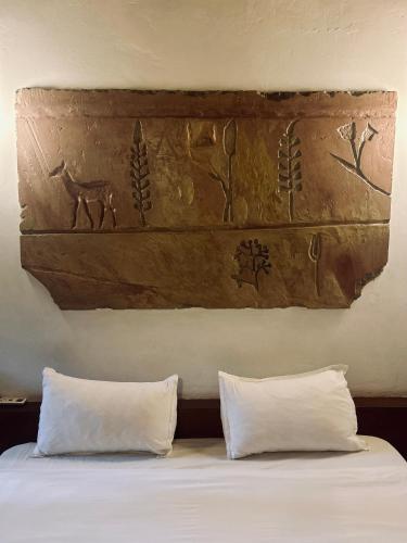 Llit o llits en una habitació de Hotel Sokhamon