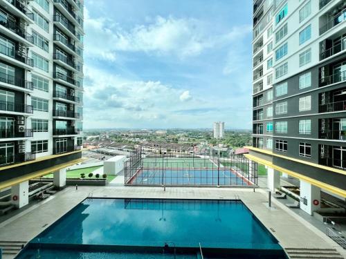 a view from the balcony of a apartment building with a swimming pool at Melaka Nova-8 Studio City-View-4pax in Malacca