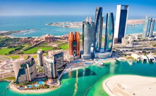 an aerial view of a city with tall buildings at Abu Dhabi Cozy studio in Abu Dhabi