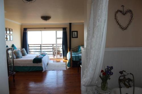 Katil atau katil-katil dalam bilik di Bluebottle Guesthouse