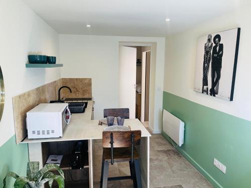 Appart Ethan PROCHE DU CENTRE AVEC PARKING ET JARDIN