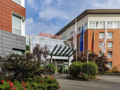 a view of the front of a moxy hotel at Mövenpick Hotel Münster am Aasee in Münster