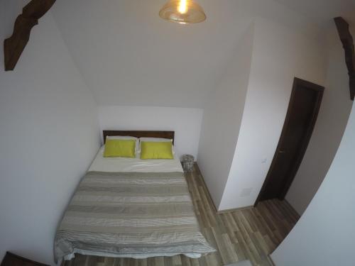 Кровать или кровати в номере Duplex Apartment Busteni