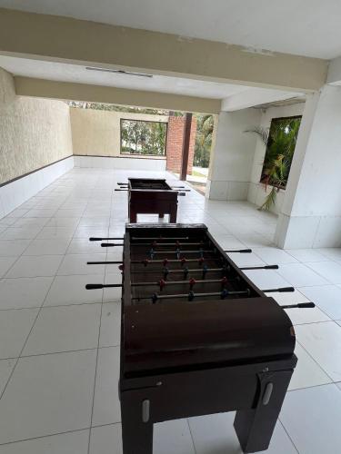 a large room with billiard tables on the floor at Flat on Mount Castelo Sairé in Sairé