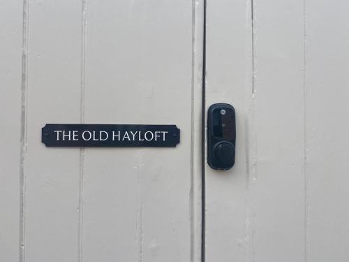 a sign on a door that reads the old hangort at The Old Hayloft Beverley Town Centre in Beverley