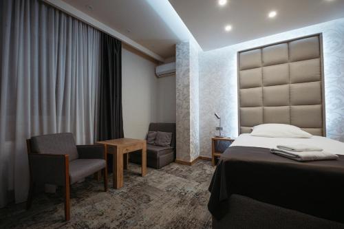 เตียงในห้องที่ Motel Bor