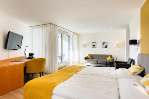 Postel nebo postele na pokoji v ubytování Hotel Schatzmann