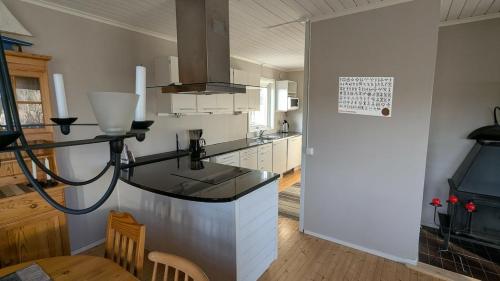 a kitchen with a sink and a counter top at Ebbas i Överboda in Överboda