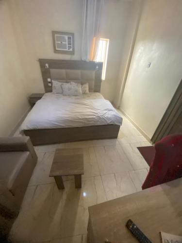 Llit o llits en una habitació de Gentle tower hotel