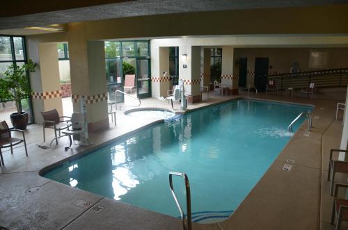 a large swimming pool in a hotel lobby at Hampton Inn & Suites Flagstaff - West in Flagstaff