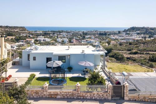 a villa with a view of the ocean at Sebastian Villas in Afantou