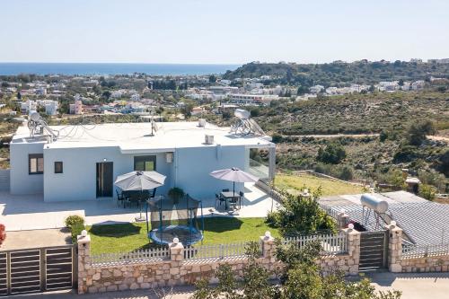 a villa with a view of a house at Sebastian Villas in Afantou