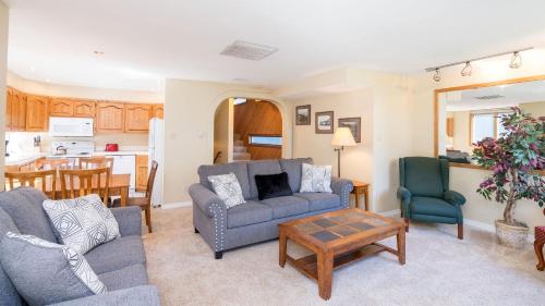 a living room with a couch and two chairs and a table at Telluride Lodge 405 by AvantStay Close to Slopes Town in Telluride