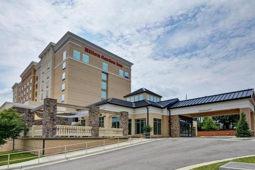 a rendering of a hotel with a parking lot at Hilton Garden Inn Raleigh/Crabtree Valley in Raleigh