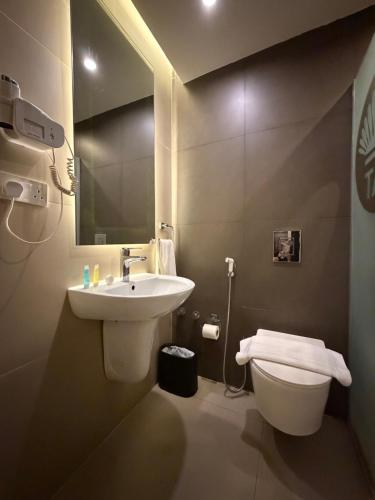 Koupelna v ubytování TAJ Hotel