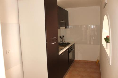 Kuchyň nebo kuchyňský kout v ubytování B&B La Torretta Chiaia