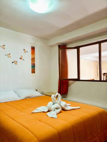 Llit o llits en una habitació de Big Vacation Hostel