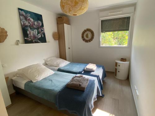 Joli F3 , 4 pers, villa Mahana , plein pied sur jardin , domaine privé criques et plages à pied