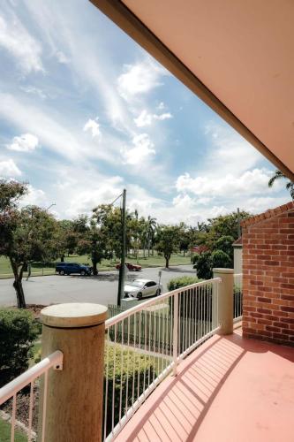 a balcony with a view of a street at Unit 2, Rocky CBD in Rockhampton