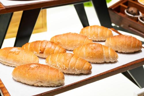 a bunch of buns sitting on a baking tray at Shangri-La Harbin in Harbin