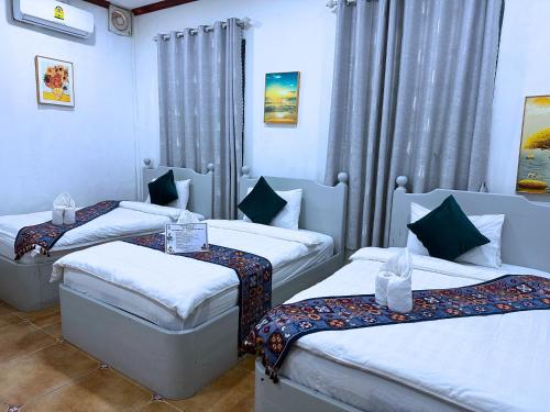 Llit o llits en una habitació de Monsane villa
