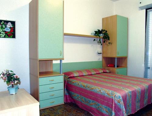 Postel nebo postele na pokoji v ubytování Hotel Basilea