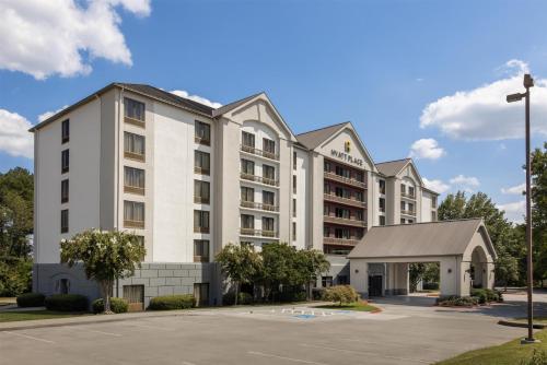 a rendering of a hotel with a parking lot at Hyatt Place Atlanta/Cobb Galleria in Atlanta