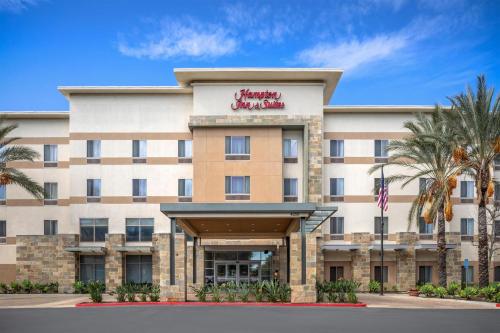 a rendering of the front of a hotel at Hampton Inn & Suites Riverside/Corona East in Riverside