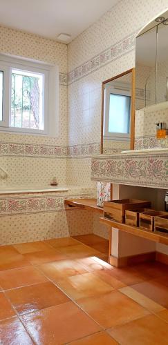 a bathroom with a sink and a mirror at Lantana luxury property in Bormes-les-Mimosas