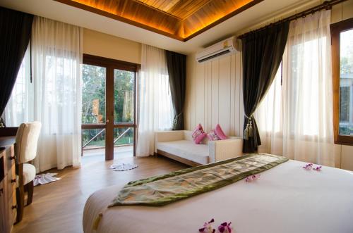 Postel nebo postele na pokoji v ubytování Koh Yao Yai Hillside Resort