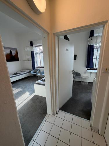 a room with a hallway with a living room at Koleje Zámeček in Lednice