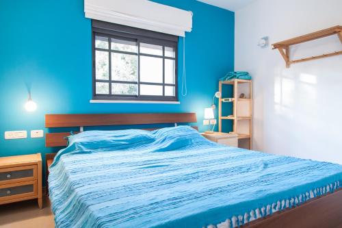 Ένα ή περισσότερα κρεβάτια σε δωμάτιο στο Carmel Home Mount Seaview