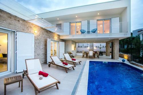 Luxury villa Rogoznica Sea Side with heated pool