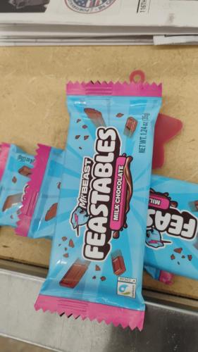 two bags of candy bars are hanging on a wall at King city California in Mee Memorial Hospital Heliport
