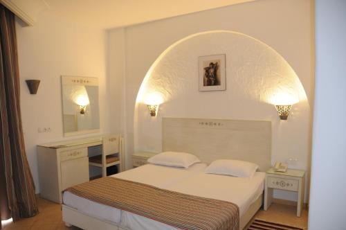 Posteľ alebo postele v izbe v ubytovaní Hotel Menara
