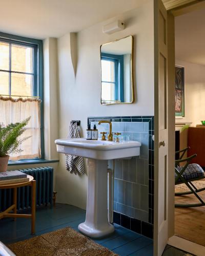 a bathroom with a sink and a mirror at 8 Holland Street Townhouse Bath in Bath