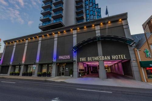 a building with a sign that reads the british embassy hotel at The Bethesdan Hotel, Tapestry Collection by Hilton in Bethesda