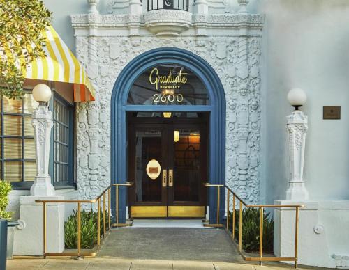 a front door of a building with a sign on it at Graduate by Hilton Berkeley in Berkeley