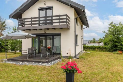 Zaciszny Dom HARALD - Taras & Ogród - Wyspa Wolin by Noclegi Renters